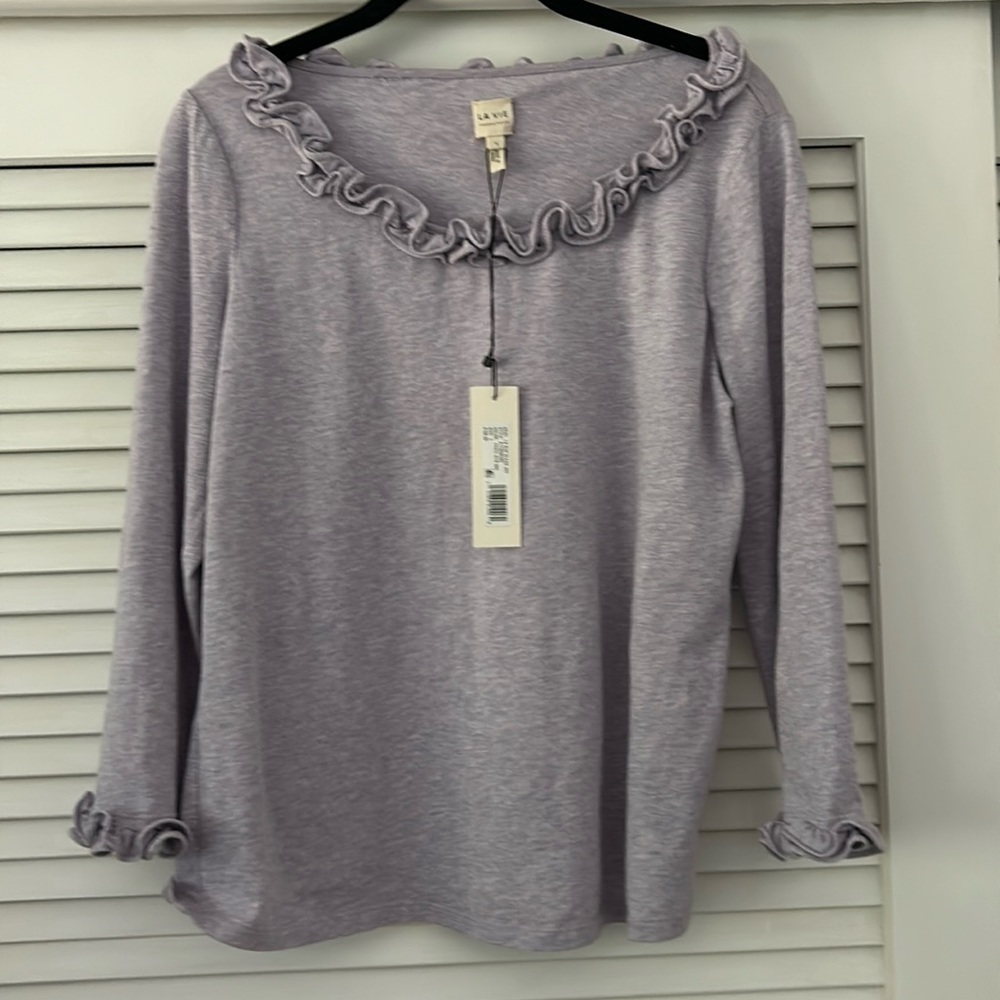 Lavender cotton top, never worn. Ruffles at neck and below elbow sleeves